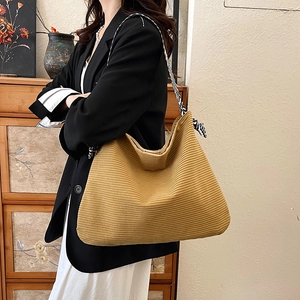 Large yellow corduroy tote bag with geometric silk scarf handle for casual commute