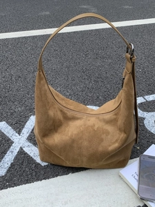 Brown suede hobo bag for women with large capacity shoulder strap and vintage style