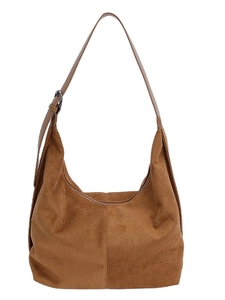 Caramel brown suede hobo bag with adjustable strap for women in a minimalist design