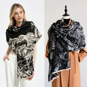 Detail of artistic mountain pattern jacquard on black and grey gradient shawl scarf