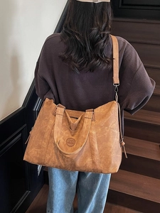 Grande borsa da viaggio marrone vintage in tela lavata con tracolla regolabile