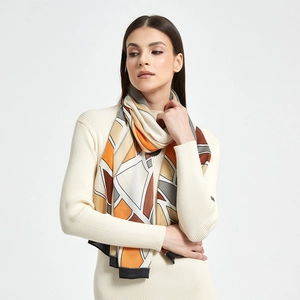 Detail of herringbone pattern silk scarf with modern abstract geometric color blocks