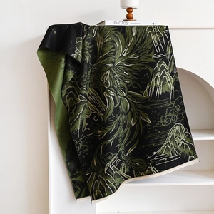 Detail of Chinese landscape jacquard knit scarf with elegant fringe and mountain pattern