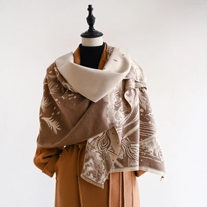 Detail of Chinese style gradient scarf with floral jacquard pattern and fringe edge