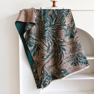Detailed texture of jacquard faux cashmere scarf with phoenix and landscape pattern