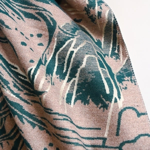 Macro detail of high-quality jacquard mountain pattern on thickened faux cashmere shawl