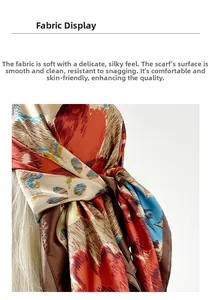 Close-up of printed satin silk scarf showing soft fabric texture and glossy finish