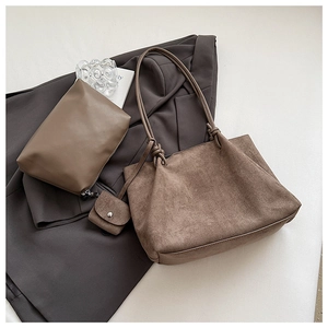 Detailed macro view of retro suede tote bag set with matching inner pouch and coin purse