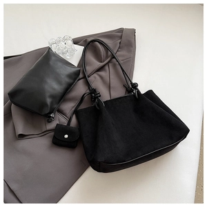 Detailed set of black suede tote bag with inner leather pouch and mini accessory bag