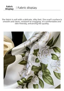 Detailed view of satin silk scarf featuring white rose prints and a smooth glossy finish