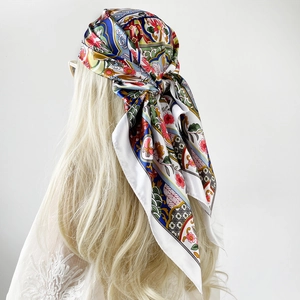 Detailed back view of vintage floral satin square scarf worn as a stylish headscarf