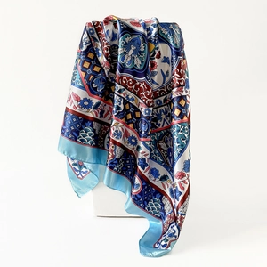 Detailed macro view of Bohemian floral printed satin scarf with elegant glossy finish