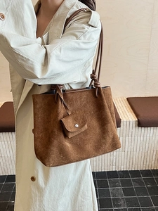 Brown vintage large tote bag in matte suede leather with a matching mini hanging pouch