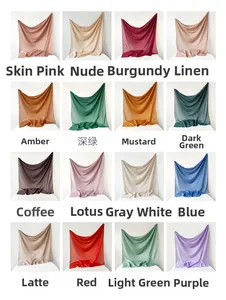 Collection of 16 vibrant colors of square silk scarves with a smooth translucent finish