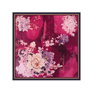 Close-up of square silk scarf featuring gradient peony flowers and elegant scroll patterns