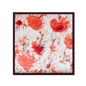 Detailed top view of a 90cm square satin scarf featuring vibrant red and orange floral patterns