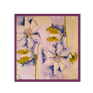 Detailed pattern of purple floral print silk scarf with green leaves and dark borders