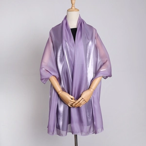 Detail of lavender organza shawl featuring a pearlescent finish and translucent texture