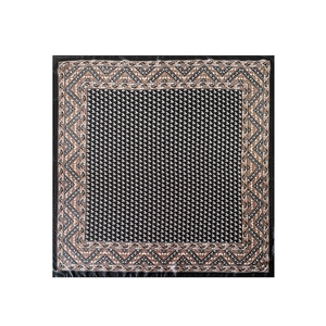 Detail of elegant satin square scarf featuring vintage floral patterns and geometric borders