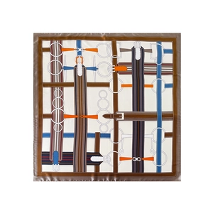 Close-up of elegant equestrian horse bridle patterns on satin silk square scarf