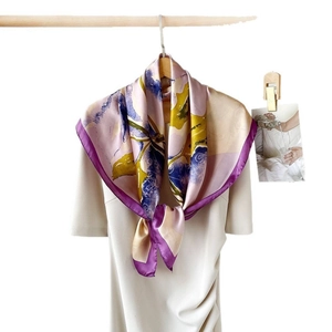 Elegant 90cm purple and gold floral satin silk scarf styled with a beige dress