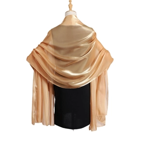 Champagne gold organza headscarf with metallic silk finish draped on a model
