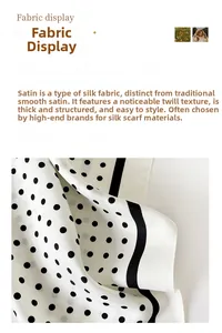Detail of silk twill fabric texture with classic black polka dots on a white scarf