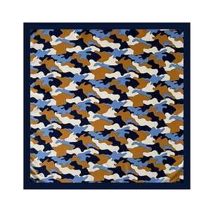 Detail of blue and brown cloud pattern silk scarf with dark blue border edges