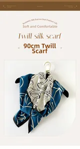Dettaglio del foulard in seta 90cm color ciano scuro e beige con stampe floreali nere