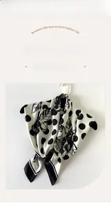 Detailed macro view of 90cm twill silk square scarf featuring elegant polka dots and floral print
