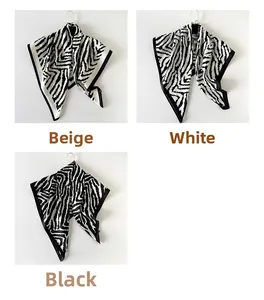 Detailed comparison of zebra print silk scarves in beige, white, and black color options