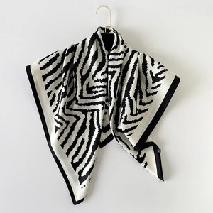 Elegant black and white zebra print square silk scarf with satin finish and black border