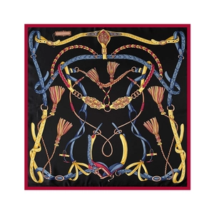Flat lay of square silk scarf with vintage equestrian harness and coat of arms motifs
