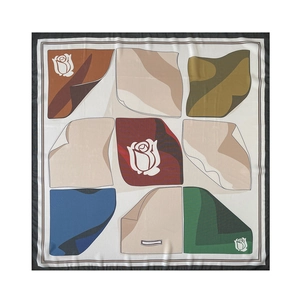 Detailed top-down view of a 90cm square silk scarf featuring colorful geometric patterns