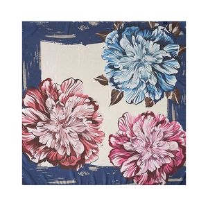 Detailed close-up of retro floral patterns on a 90x90cm square faux silk scarf