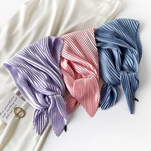 Pleated silk scarves in purple pink and blue with a gold D-buckle fashion accessory