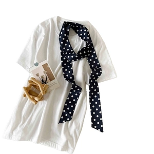 Polka dot skinny neck scarf paired with a minimalist white cotton crew neck T-shirt