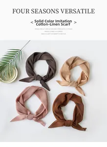 Flat lay of pleated cotton linen scarves in brown, beige, and pink with textured detail