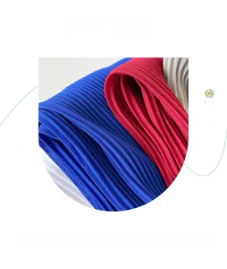 Detailed pleated texture of pearl chiffon hijabs in blue, red, and grey colors