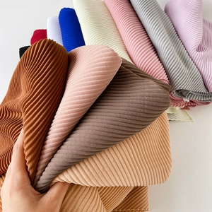 Solid color pleated chiffon hijab scarves in multiple colors showing texture and drape
