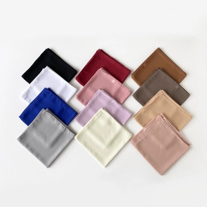 Detailed grid display of twelve solid color chiffon square scarves with fine rolled edges