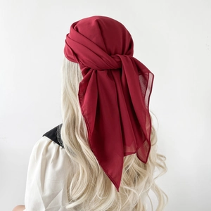 Close-up of lightweight wine red chiffon hijab showing fabric texture and back knot detail