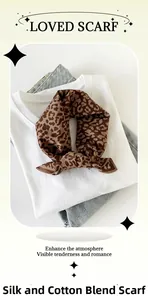 Detailed close-up of brown leopard print silk cotton blend square scarf with hand-rolled edges