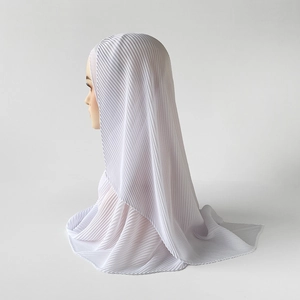 Detailed view of white pleated chiffon hijab featuring a uniform crushed fabric texture