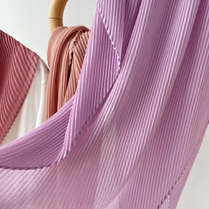 Detail view of light purple pleated chiffon shawl showing elegant texture and drape