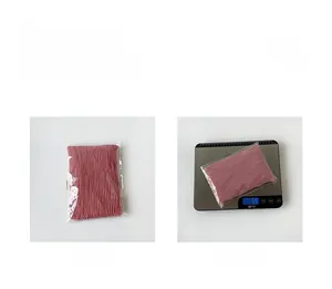 Pink pleated chiffon hijab scarf shown in simple packaging with weight of 59g