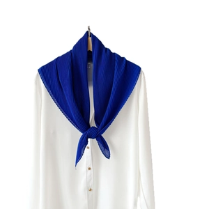 Elegant royal blue pleated chiffon scarf paired with a classic white button-down shirt
