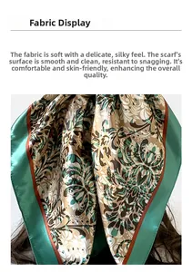 Macro detail of soft satin silk scarf fabric showing elegant vintage floral pattern