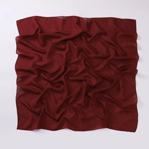 Detail view of wine red cotton linen square scarf with breathable fabric texture