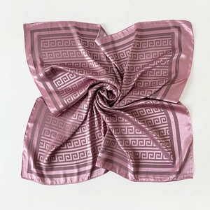 Macro shot of silk-like satin square scarf with lilac Greek Key pattern and glossy finish